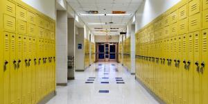School hallway with yellow lockers